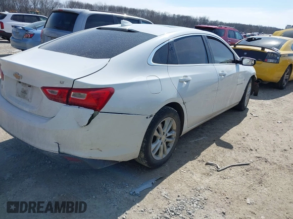 2018 Chevrolet Malibu LT z VIN 1G1ZD5ST6JF238524, wystawiony jako IAAI lot #41701717 z przebiegiem 167 986 mil mil oraz . Historia ofert i sprzedaży dostępna na DreamBid. Obrazek 4.