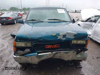 1995 GMC Suburban with VIN 1GDFK16K8SJ741041, listed as a IAAI auction lot 42315676 with 159,312 mi miles and . Bid and sale history available at DreamBid. Image 12.