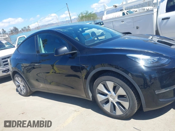 2020 Tesla Model Y Long Range with VIN 5YJYGDEE2LF059177, listed as a IAAI auction lot 41916260 with 66,190 mi miles and . Bid and sale history available at DreamBid. Image 13.