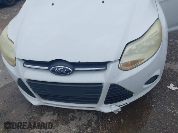 2014 Ford Focus SE z VIN 1FADP3K2XEL170956, wystawiony jako IAAI lot #42480166 z przebiegiem 237 977 mil mil oraz . Historia ofert i sprzedaży dostępna na DreamBid. Obrazek 6.