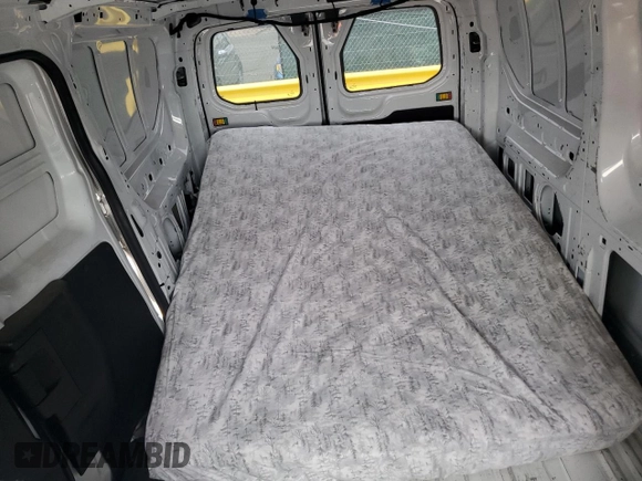 2017 Ford Transit with VIN 1FTYR1ZM7HKB14498, listed as a Copart auction lot 50426995 with 113,262 mi miles and Salvage Title. Bid and sale history available at DreamBid. Image 10.