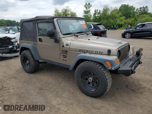 2004 Jeep Wrangler Rubicon z VIN 1J4FA69S24P713388, wystawiony jako Copart lot #61196515 z przebiegiem 155 092 mil mil oraz Czysty tytuł • Clean title. Historia ofert i sprzedaży dostępna na DreamBid. Obrazek 4.