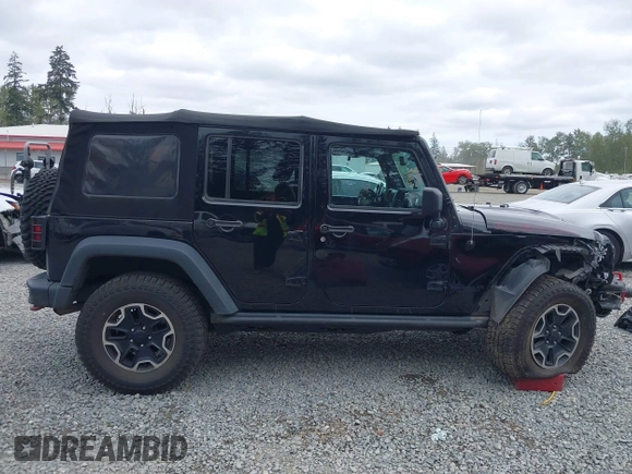 2015 Jeep Wrangler Unlimited Rubicon Hard Rock with VIN 1C4HJWFG6FL757421, listed as a IAAI auction lot 42107514 with 63,997 mi miles and . Bid and sale history available at DreamBid. Image 14.