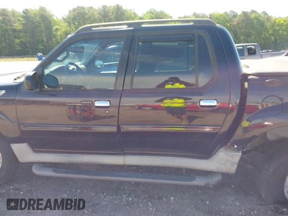 2003 Ford Explorer Sport Trac XLS z VIN 1FMZU77E23UB74361, wystawiony jako IAAI lot #42305659 z przebiegiem 193 291 mil mil oraz . Historia ofert i sprzedaży dostępna na DreamBid. Obrazek 14.