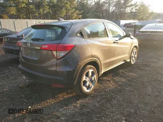 2021 Honda HR-V LX with VIN 3CZRU5H3XMM734410, listed as a IAAI auction lot 41441387 with 63,055 mi miles. Bid and sale history available at carsss.com. Image 4.