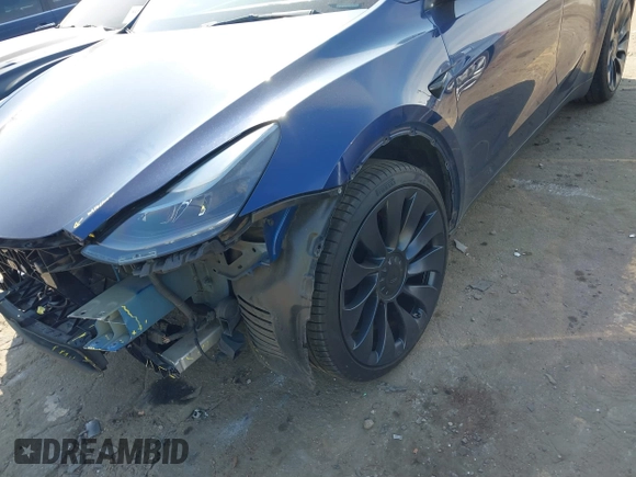 2022 Tesla Model Y Performance with VIN 7SAYGDEF7NF497076, listed as a IAAI auction lot 41759793 with 46,970 mi miles and . Bid and sale history available at DreamBid. Image 18.