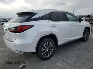 2020 Lexus RX with VIN 2T2AZMAA9LC160005, listed as a Copart auction lot 86916644 with 63,699 mi miles and Salvage Title. Bid and sale history available at carsss.com. Image 3.