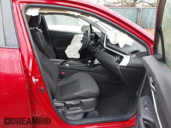 2020 Toyota C-HR LE with VIN JTNKHMBX4L1067648, listed as a IAAI auction lot 41556302 with 64,698 mi miles. Bid and sale history available at carsss.com. Image 5.