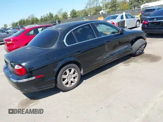 2003 Jaguar S-Type with VIN SAJEA01T13FM70486, listed as a IAAI auction lot 41989501 with 100,109 mi miles and . Bid and sale history available at DreamBid. Image 4.