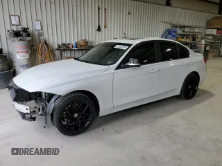2015 BMW 3 Series 328i xDrive with VIN WBA3B3C58FJ985115, listed as a Copart auction lot 51002555 with 69,790 mi miles and Salvage Title. Bid and sale history available at carsss.com. Image 1.