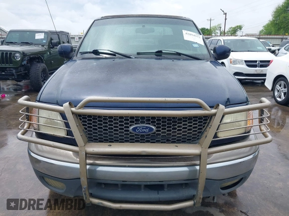 2003 Ford F-150 XLT with VIN 1FTRW07L33KC83234, listed as a IAAI auction lot 41894573 with 215,232 mi miles. Bid and sale history available at carsss.com. Image 12.