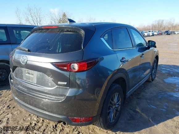 2019 Mazda CX-5 Touring with VIN JM3KFBCM2K0659550, listed as a IAAI auction lot 41744105 with NaN miles. Bid and sale history available at carsss.com. Image 4.