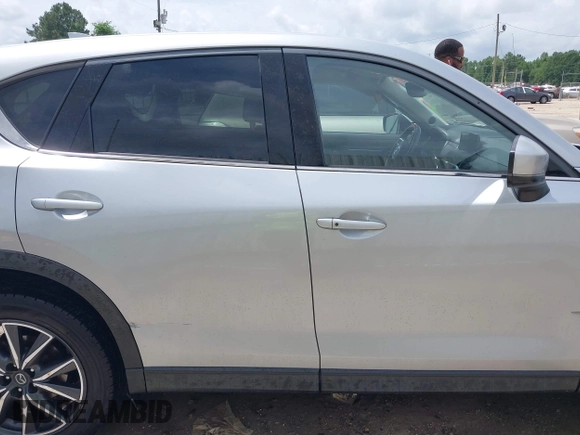 2018 Mazda CX-5 Grand Touring with VIN JM3KFADM6J0339185, listed as a IAAI auction lot 42160763 with 86,312 mi miles and . Bid and sale history available at DreamBid. Image 13.