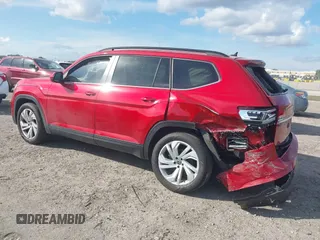 2021 Volkswagen Atlas SE z VIN 1V2WR2CA3MC526612, wystawiony jako IAAI lot #41625077 z przebiegiem 70 856 mil mil oraz . Historia ofert i sprzedaży dostępna na DreamBid. Obrazek 3.