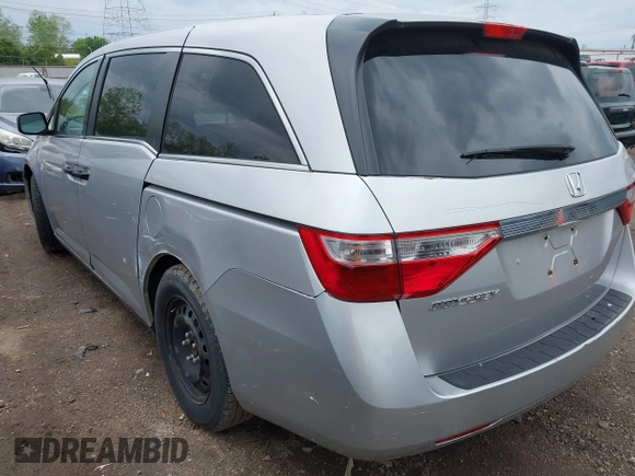 2012 Honda Odyssey LX with VIN 5FNRL5H22CB110569, listed as a IAAI auction lot 42151633 with 253,812 mi miles and . Bid and sale history available at carsss.com. Image 3.