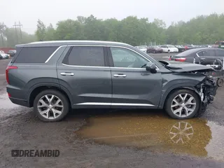 2022 Hyundai Palisade SEL with VIN KM8R4DHE3NU377999, listed as a IAAI auction lot 42258833 with 41,216 mi miles and . Bid and sale history available at DreamBid. Image 13.