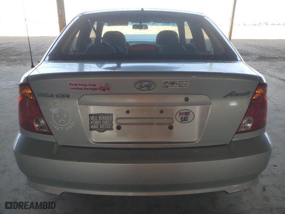 2004 Hyundai Accent GL with VIN KMHCG35CX4U283952, listed as a Copart auction lot 73587124 with 41,742 mi miles and Salvage Title. Bid and sale history available at carsss.com. Image 6.