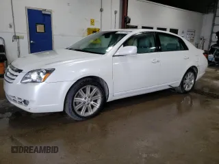 2006 Toyota Avalon XL z VIN 4T1BK36B86U150304, wystawiony jako Copart lot #57402735 z przebiegiem 244 634 mil mil oraz Czysty tytuł • Clean title. Historia ofert i sprzedaży dostępna na DreamBid. Obrazek 1.
