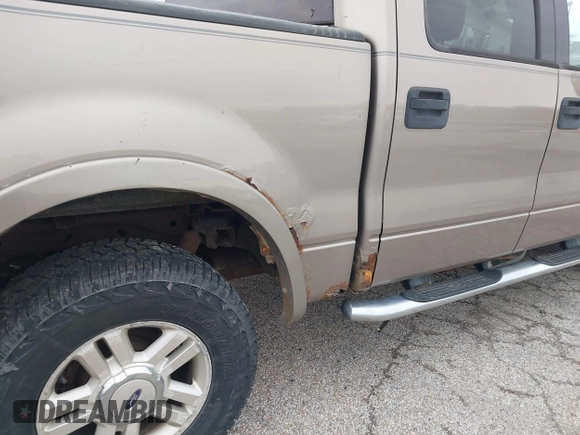 2004 Ford F-150 XLT with VIN 1FTPW145X4KD20526, listed as a IAAI auction lot 41959462 with 166,545 mi miles. Bid and sale history available at carsss.com. Image 12.