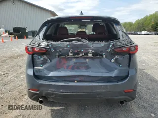 2023 Mazda CX-5 S Carbon Edition z VIN JM3KFBCM9P0158890, wystawiony jako Copart lot #53839045 z przebiegiem 26 623 mil mil oraz Szkody całkowita. Historia ofert i sprzedaży dostępna na DreamBid. Obrazek 6.
