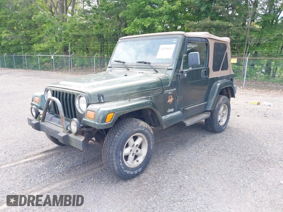 1998 Jeep Wrangler Sahara z VIN 1J4FY49SXWP716218, wystawiony jako IAAI lot #42354433 z przebiegiem 234 378 mil mil oraz . Historia ofert i sprzedaży dostępna na DreamBid. Obrazek 2.