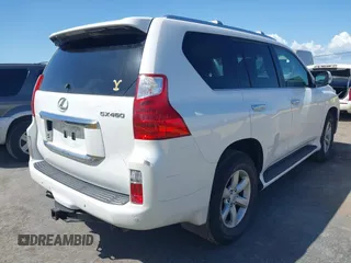 2011 Lexus GX 460 with VIN JTJBM7FX3B5024239, listed as a IAAI auction lot 41958654 with 215,380 mi miles. Bid and sale history available at carsss.com. Image 4.