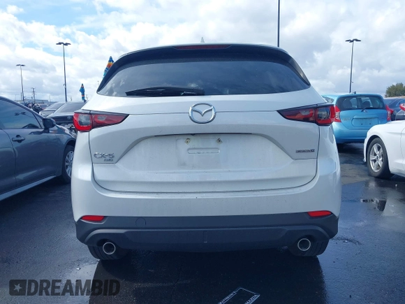 2023 Mazda CX-5 2.5 S Premium Plus Package with VIN JM3KFBEM4P0112803, listed as a IAAI auction lot 41588872 with 25,087 mi miles. Bid and sale history available at carsss.com. Image 16.