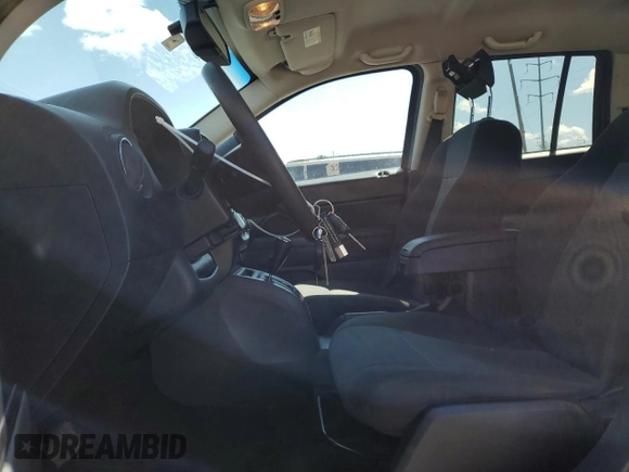 2017 Jeep Compass Sport with VIN 1C4NJCBA6HD123526, listed as a Copart auction lot 52324725 with 169,861 mi miles and Salvage Title. Bid and sale history available at carsss.com. Image 7.