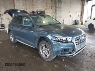 2018 Audi Q5 Premium z VIN WA1ANAFY0J2034450, wystawiony jako IAAI lot #42171507 z przebiegiem 129 327 mil mil oraz . Historia ofert i sprzedaży dostępna na DreamBid. Obrazek 1.