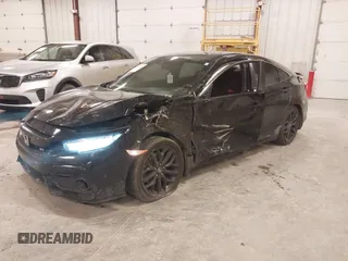 2020 Honda Civic Si z VIN 2HGFC1E58LH704721, wystawiony jako IAAI lot #42222371 z przebiegiem 82 808 mil mil oraz . Historia ofert i sprzedaży dostępna na DreamBid. Obrazek 2.