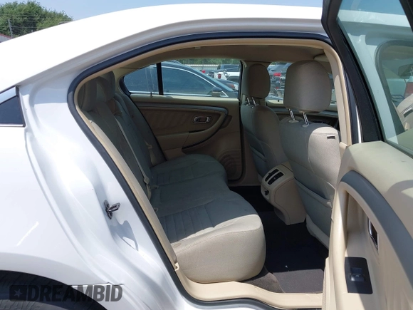2015 Ford Taurus SE with VIN 1FAHP2D8XFG105029, listed as a IAAI auction lot 42068632 with 164,098 mi miles and . Bid and sale history available at carsss.com. Image 8.