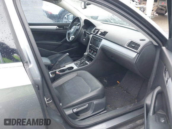 2013 Volkswagen Passat SE w/Sunroof & Nav with VIN 1VWBP7A33DC072530, listed as a IAAI auction lot 41906797 with 118,110 mi miles. Bid and sale history available at carsss.com. Image 5.