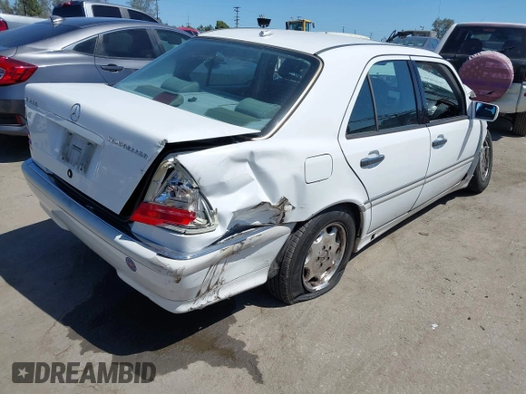 2000 Mercedes-Benz C 230 Kompressor with VIN WDBHA24GXYA833828, listed as a IAAI auction lot 42304685 with Not provided miles and . Bid and sale history available at DreamBid. Image 4.
