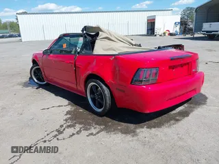 2003 Ford Mustang Deluxe z VIN 1FAFP44453F358762, wystawiony jako IAAI lot #42038789 z przebiegiem Nie podano mil oraz . Historia ofert i sprzedaży dostępna na DreamBid. Obrazek 3.