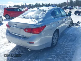 2015 Infiniti Q50 Premium z VIN JN1BV7ARXFM395132, wystawiony jako IAAI lot #41618895 z przebiegiem 96 951 mil mil oraz . Historia ofert i sprzedaży dostępna na DreamBid. Obrazek 4.