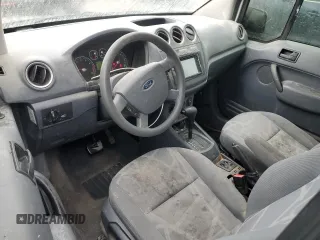 2010 Ford Transit Connect XLT z VIN NM0KS9BN5AT032732, wystawiony jako Copart lot #53851165 z przebiegiem 229 512 mil mil oraz Szkoda całkowita • Salvage title. Historia ofert i sprzedaży dostępna na DreamBid. Obrazek 8.
