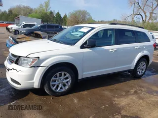 2014 Dodge Journey SE with VIN 3C4PDCAB0ET293641, listed as a IAAI auction lot 42001844 with 138,740 mi miles. Bid and sale history available at carsss.com. Image 14.