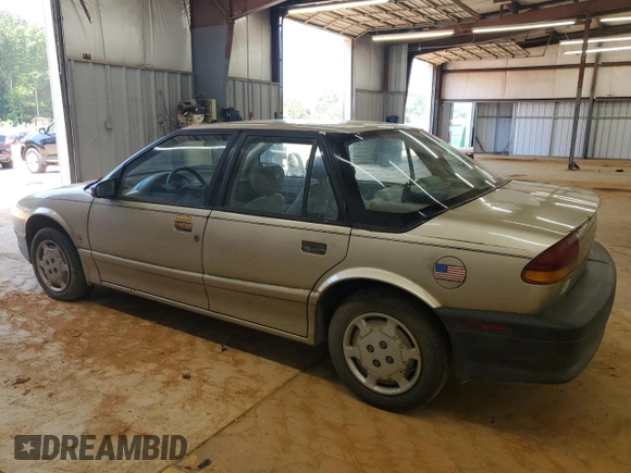 1995 Saturn SL with VIN 1G8ZH5280SZ302560, listed as a Copart auction lot 63290495 with 123,475 mi miles and Clean title. Bid and sale history available at DreamBid. Image 2.