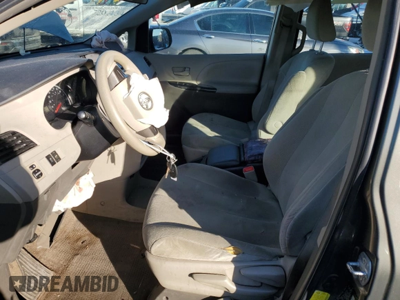 2012 Toyota Sienna with VIN 5TDZK3DC7CS177475, listed as a Copart auction lot 42987655 with 171,641 mi miles and Salvage Title. Bid and sale history available at carsss.com. Image 7.