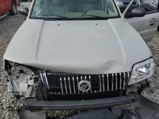 2007 Mercury Mariner with VIN 4M2CU39H37KJ19438, listed as a Copart auction lot 57053375 with 136,893 mi miles and Clean title. Bid and sale history available at DreamBid. Image 12.
