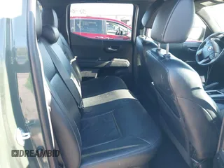 2021 Toyota Tacoma SR with VIN 3TMCZ5AN7MM395940, listed as a IAAI auction lot 41240832 with 39,338 mi miles and . Bid and sale history available at DreamBid. Image 8.