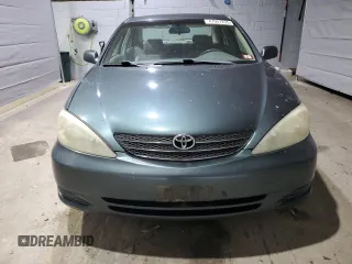 2004 Toyota Camry LE z VIN 4T1BE32K74U311882, wystawiony jako Copart lot #47997235 z przebiegiem 205 299 mil mil oraz Szkoda całkowita • Salvage title. Historia ofert i sprzedaży dostępna na DreamBid. Obrazek 5.