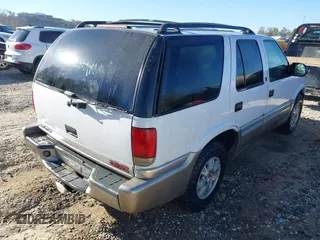 1999 GMC Jimmy SLE with VIN 1GKDT13W9X2545745, listed as a IAAI auction lot 40566227 with 1 mi miles. Bid and sale history available at carsss.com. Image 4.