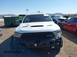 2021 Dodge Durango SRT Hellcat with VIN 1C4SDJH96MC692601, listed as a IAAI auction lot 41764490 with 27,434 mi miles and . Bid and sale history available at DreamBid. Image 6.