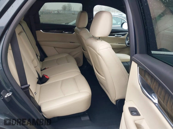 2019 Cadillac XT5 FWD with VIN 1GYKNARS5KZ220134, listed as a IAAI auction lot 41472927 with 58,229 mi miles and . Bid and sale history available at DreamBid. Image 8.