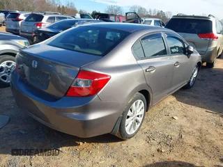 2012 Honda Civic EX with VIN 19XFB2F81CE380880, listed as a IAAI auction lot 41595729 with 118,286 mi miles and . Bid and sale history available at DreamBid. Image 4.