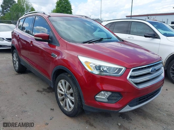2017 Ford Escape Titanium with VIN 1FMCU0JD7HUD49336, listed as a IAAI auction lot 42028518 with 153,147 mi miles. Bid and sale history available at carsss.com. Image 1.