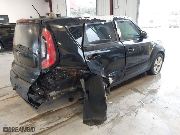 2016 Kia Soul with VIN KNDJN2A25G7355684, listed as a IAAI auction lot 41656848 with 103,501 mi miles. Bid and sale history available at carsss.com. Image 4.