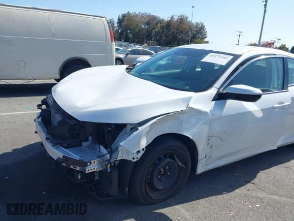 2020 Honda Civic LX z VIN 19XFC2F67LE212561, wystawiony jako IAAI lot #42272481 z przebiegiem 50 681 mil mil oraz . Historia ofert i sprzedaży dostępna na DreamBid. Obrazek 18.