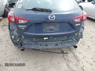 2014 Mazda 3 i Grand Touring with VIN JM1BM1M77E1133477, listed as a IAAI auction lot 41861051 with 124,377 mi miles and . Bid and sale history available at DreamBid. Image 6.